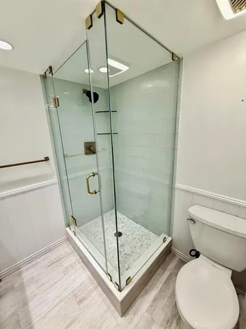 a view of a room with racks on the wall