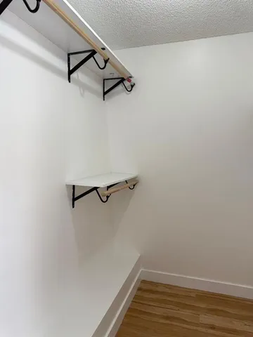 a view of a patio with wooden floor