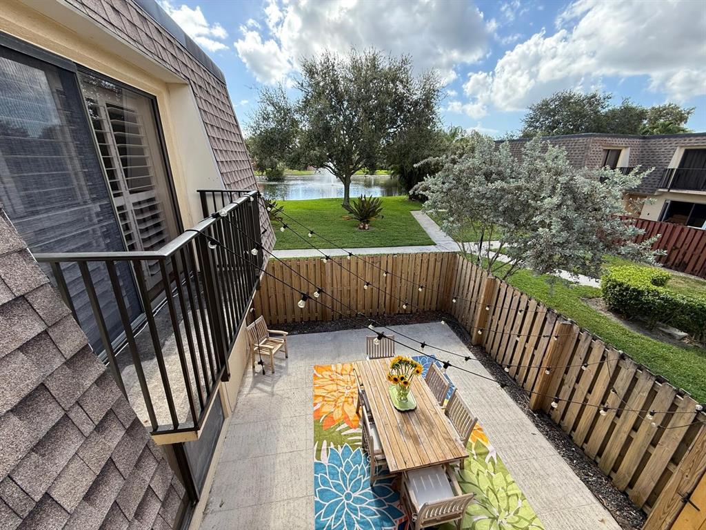 2911 Southwest 22nd Circle, Unit 37B Delray Beach, FL 33445 - Photo 37 of 51 a view of deck with patio