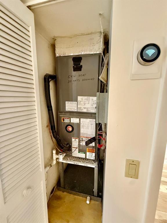 2911 Southwest 22nd Circle, Unit 37B Delray Beach, FL 33445 - Photo 41 of 51 a room with storage and utility