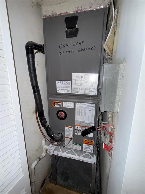 2911 Southwest 22nd Circle, Unit 37B Delray Beach, FL 33445 - Photo 42 of 51 a bathroom with a sink and mirror