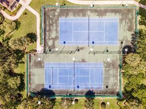 2911 Southwest 22nd Circle, Unit 37B Delray Beach, FL 33445 - Photo 46 of 51 a view of a bathroom with a tub and shower