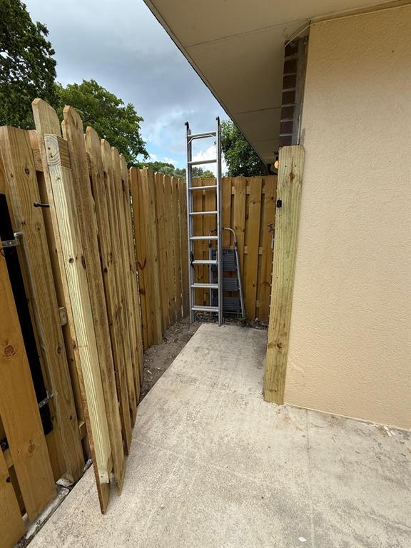 2911 Southwest 22nd Circle, Unit 37B Delray Beach, FL 33445 - Photo 5 of 51 a view of outdoor space with wooden wall