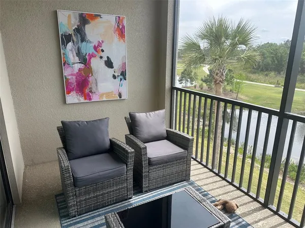 a view of a couch in a balcony