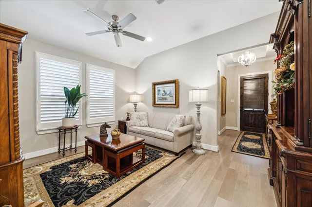 a living room with furniture and a window