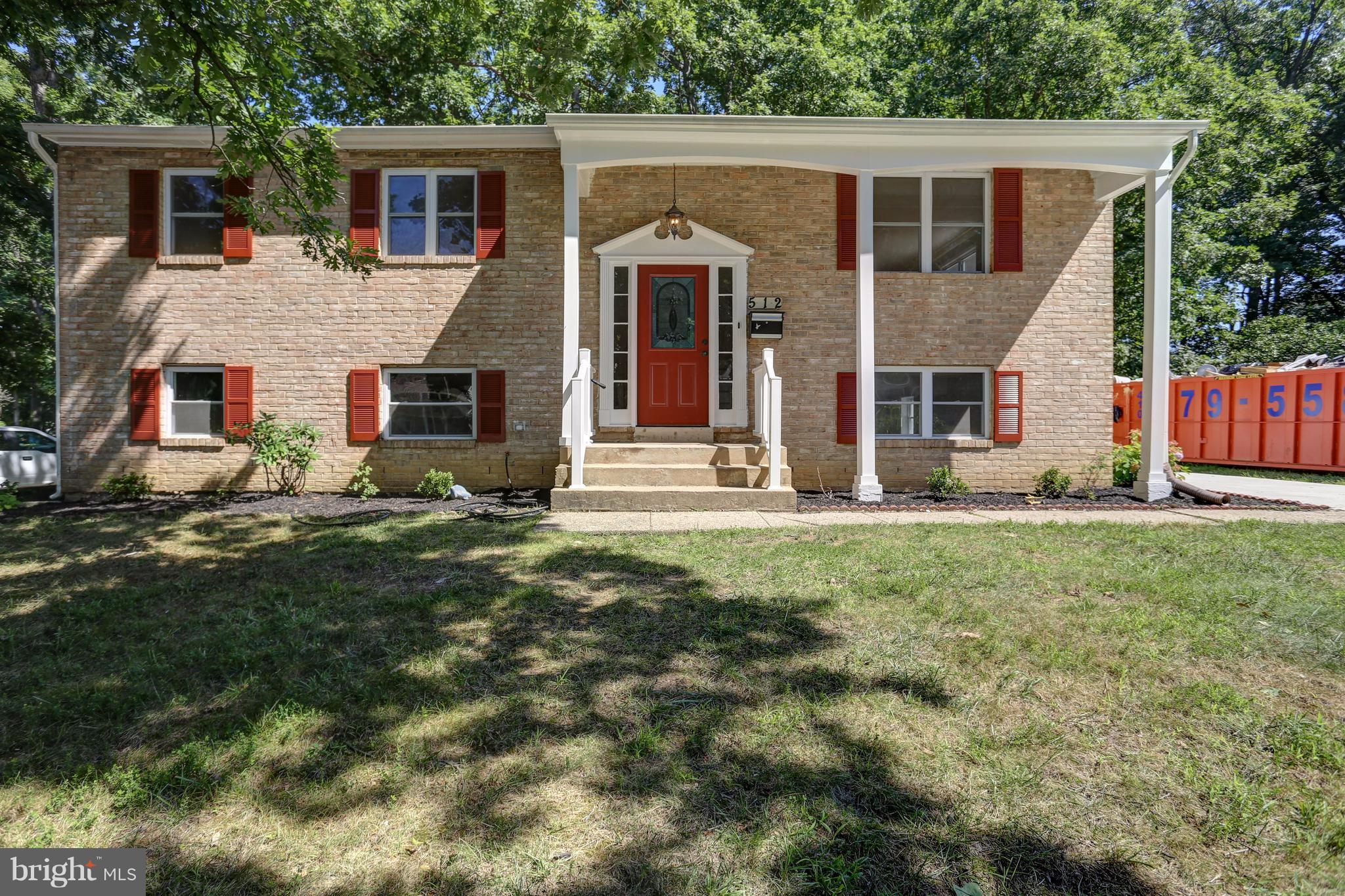 512 Crosby Road Baltimore, MD 21228 - Photo 1 of 30 front view of house with a yard