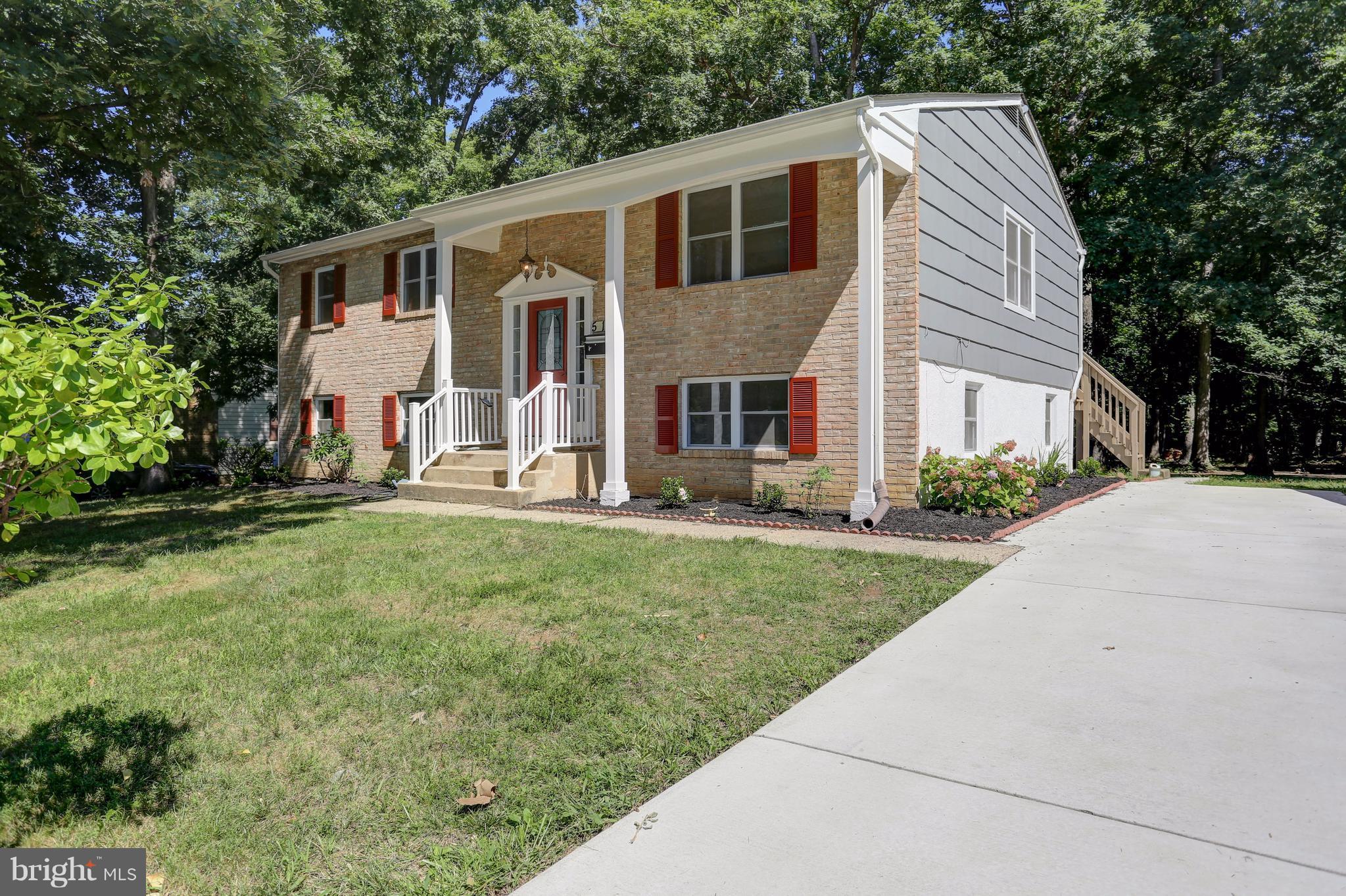 512 Crosby Road Baltimore, MD 21228 - Photo 2 of 30 a view of a house with backyard and garden