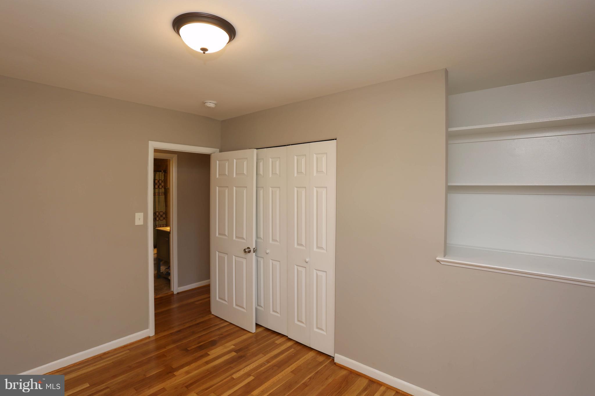512 Crosby Road Baltimore, MD 21228 - Photo 18 of 30 a view of a livingroom with wooden floor