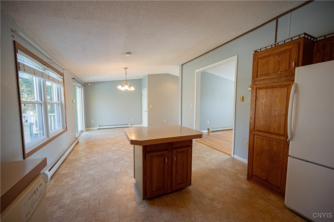 9001 Summit Road Paris, NY 13318 - Photo 17 of 50 View from kitchen to dining room