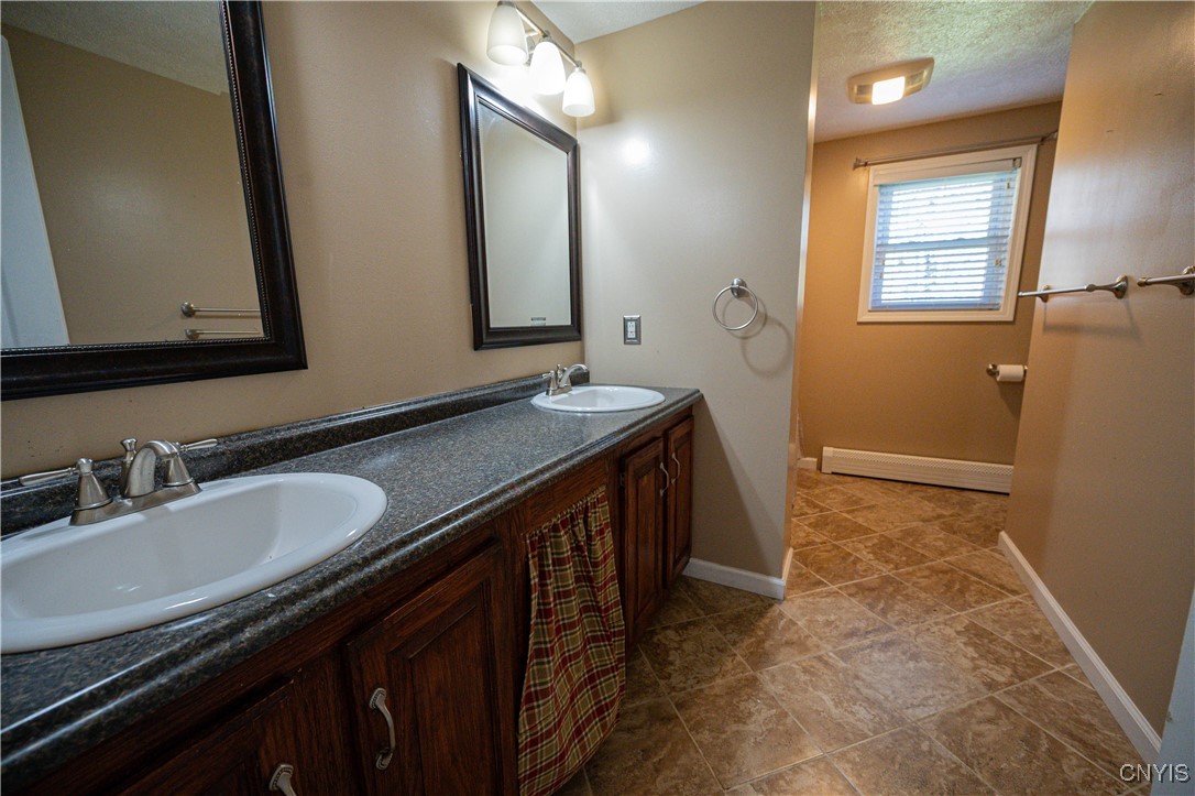 9001 Summit Road Paris, NY 13318 - Photo 25 of 50 Second Bathroom with double sinks tub/shower