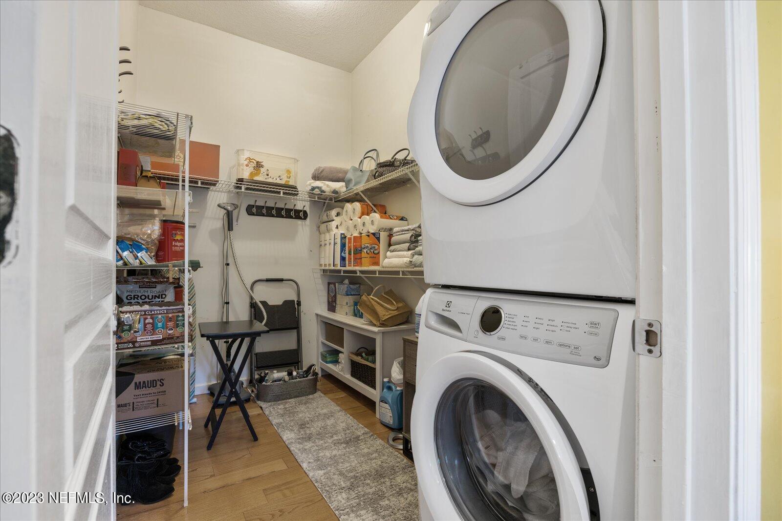 1100 Oak Ridge Road St. Augustine, FL 32086 - Photo 36 of 95 a view of a storage and utility room with washer and dryer