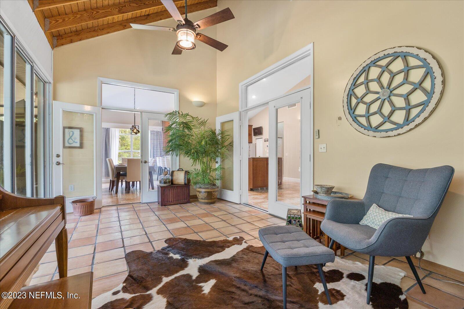 1100 Oak Ridge Road St. Augustine, FL 32086 - Photo 51 of 95 a living room with furniture and wooden floor