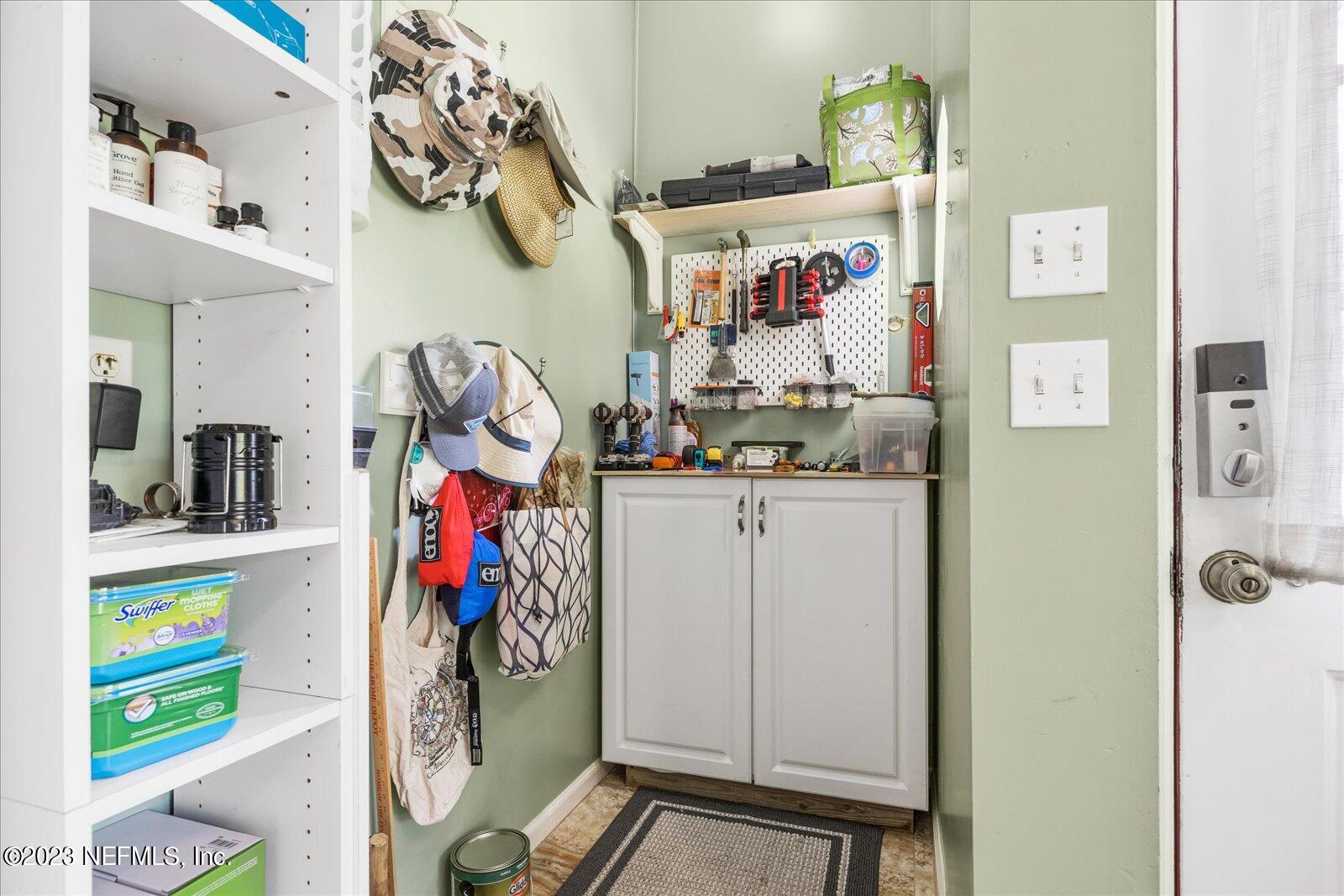 1100 Oak Ridge Road St. Augustine, FL 32086 - Photo 53 of 95 a view of storage and utility room with a lot of stuff