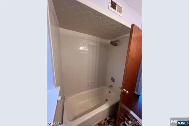 a bathroom with a bathtub
