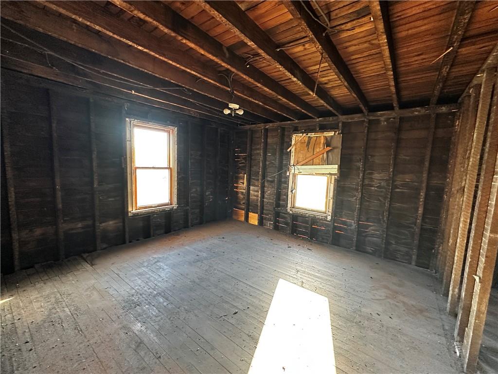 92 2nd Street Uniontown, PA 15401 - Photo 8 of 10 a view of empty room with wooden floor and fan