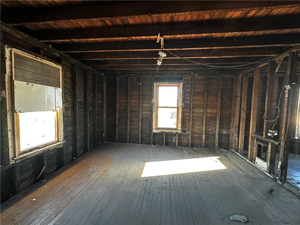 92 2nd Street Uniontown, PA 15401 - Photo 9 of 10 a view of empty room with wooden floor and fan