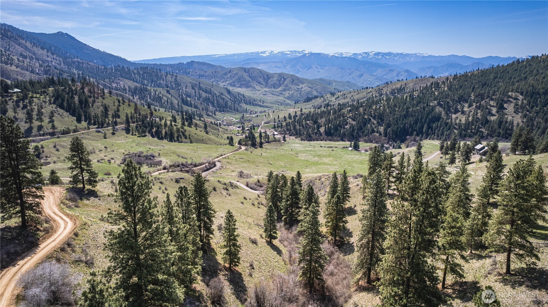 9640 Nahahum Canyon Road Cashmere, WA 98815 - Photo 14 of 25 a view of a mountain with a yard
