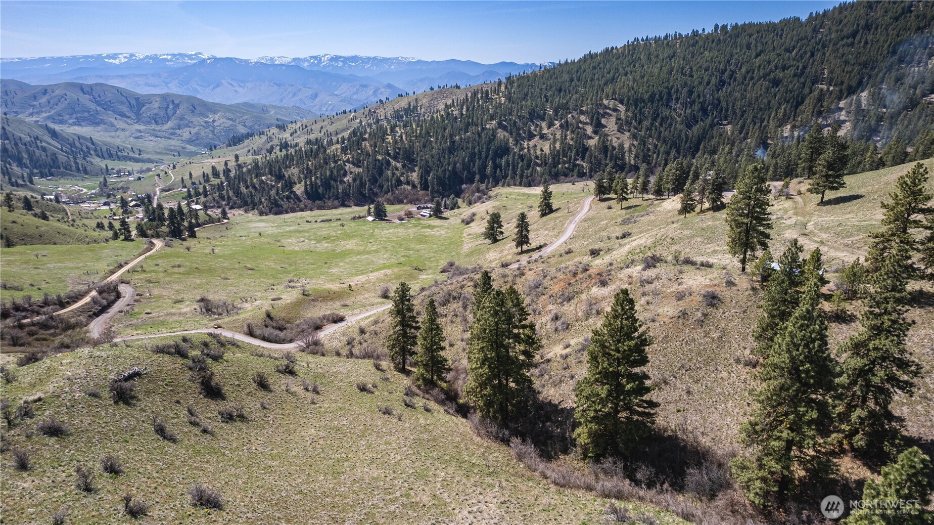 9640 Nahahum Canyon Road Cashmere, WA 98815 - Photo 17 of 25 a view of a town with mountains in the background