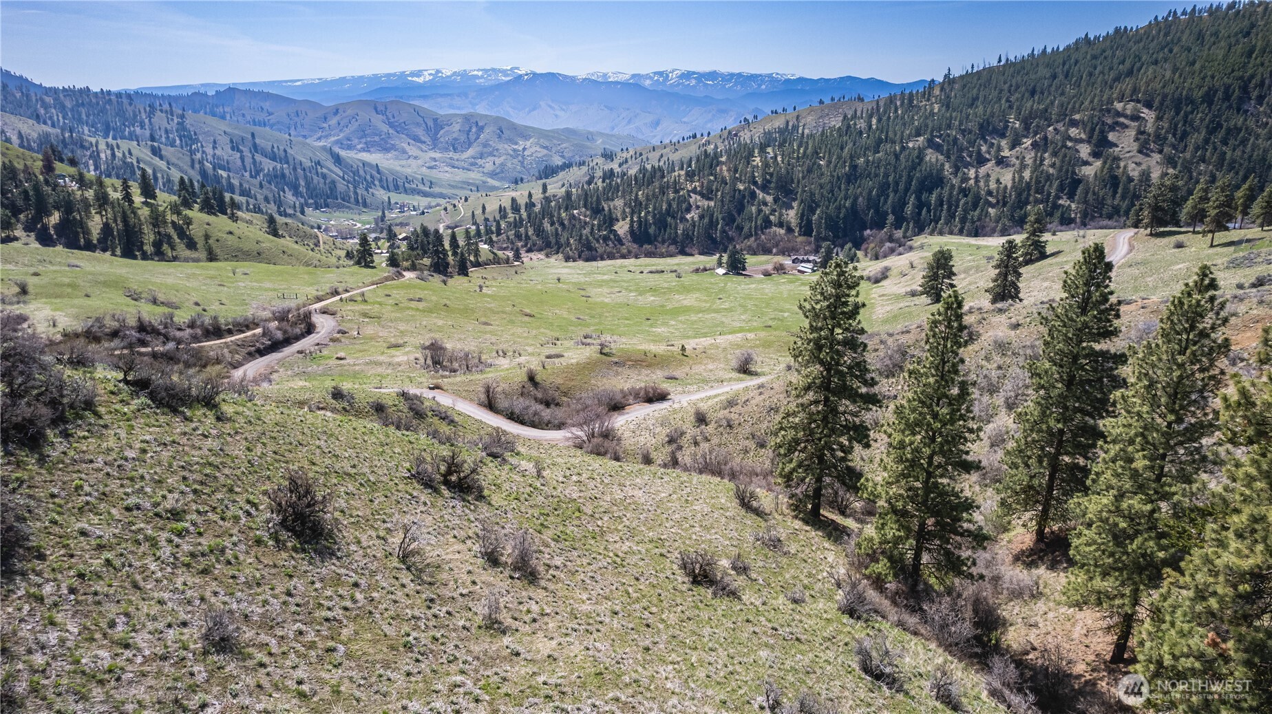 9640 Nahahum Canyon Road Cashmere, WA 98815 - Photo 22 of 25 a view of a backyard with wooden fence
