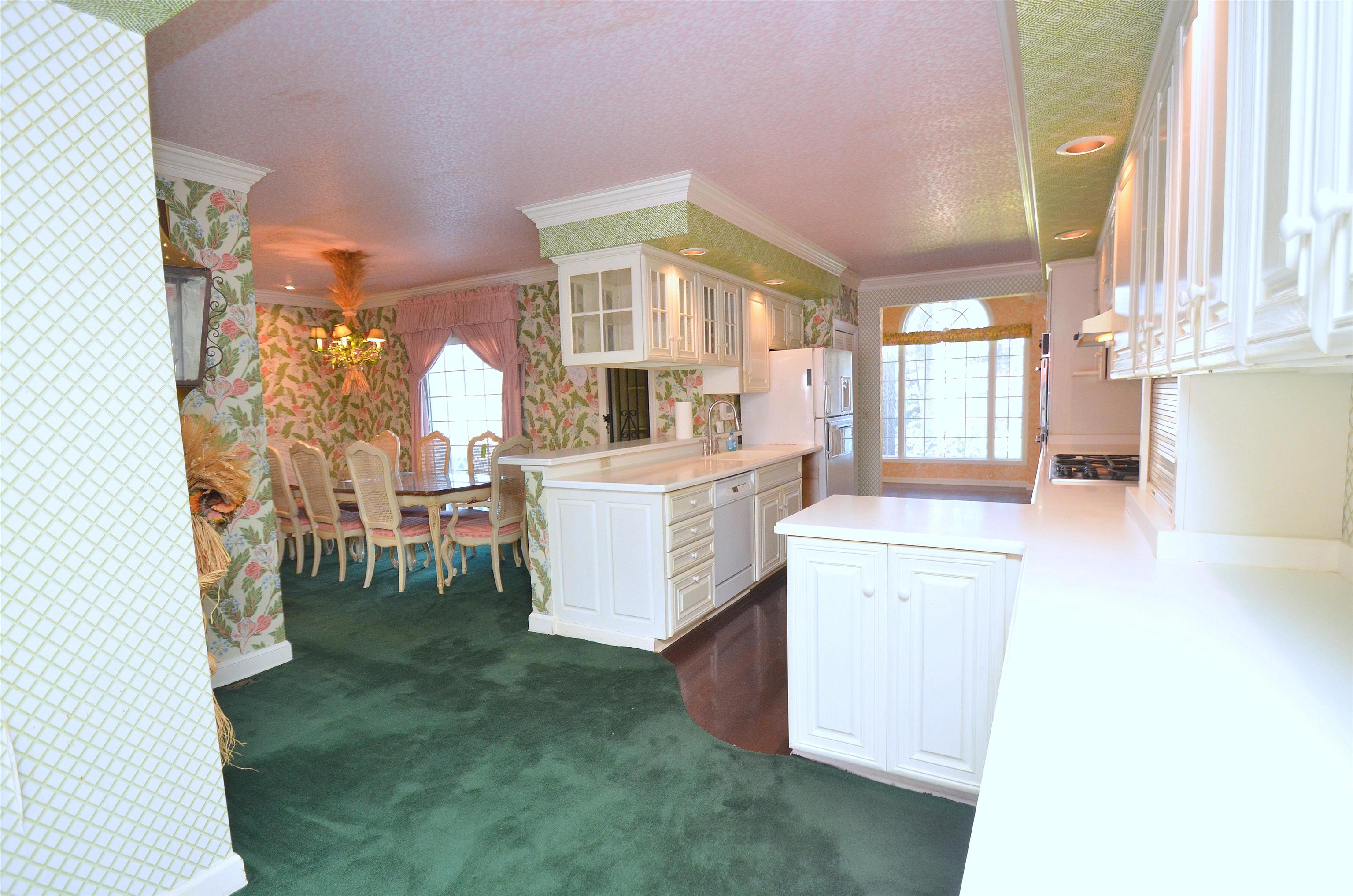4980 Spring Brook Road Rockford, IL 61114 - Photo 16 of 50 a view of a kitchen with appliances and cabinets