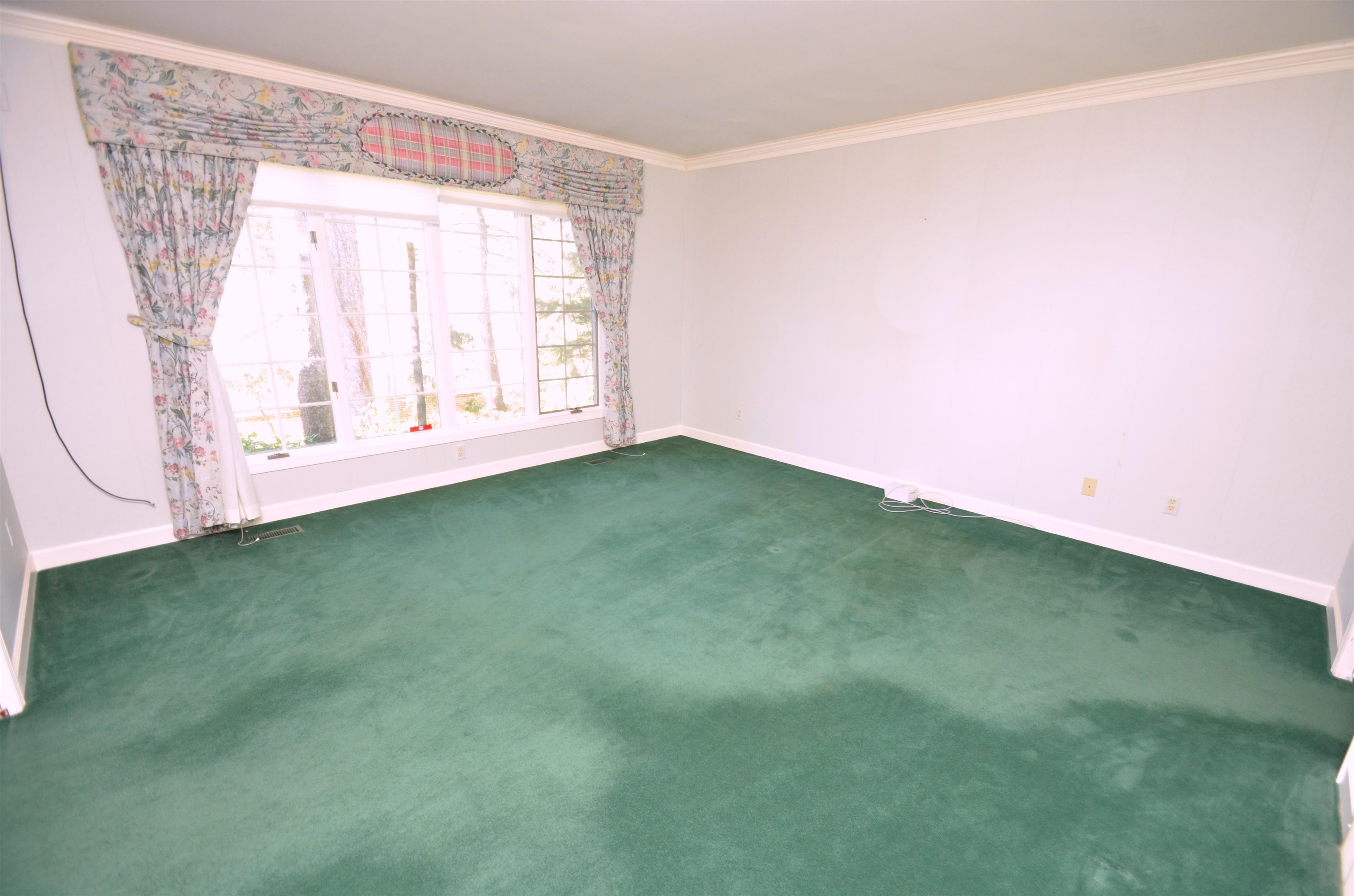 4980 Spring Brook Road Rockford, IL 61114 - Photo 23 of 50 a view of a big room with windows and yard
