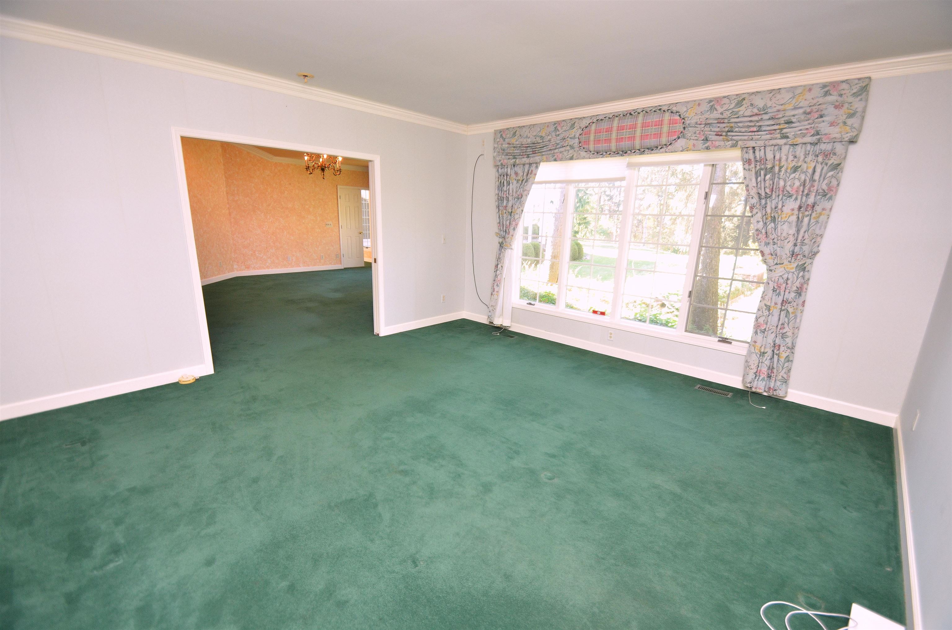 4980 Spring Brook Road Rockford, IL 61114 - Photo 24 of 50 a view of a big room with windows and yard