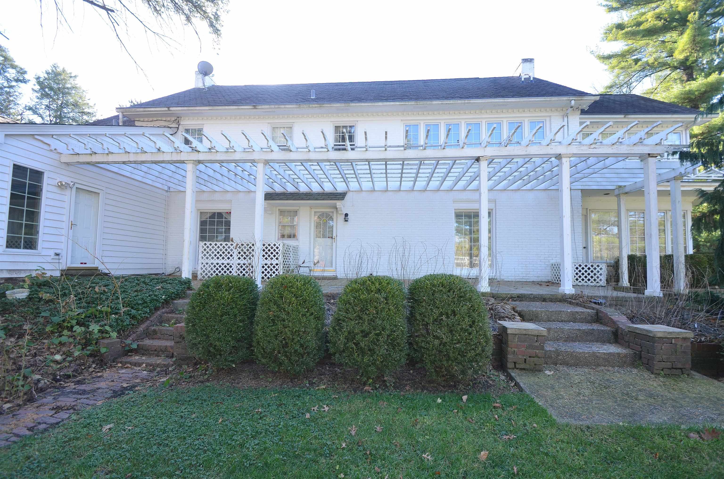 4980 Spring Brook Road Rockford, IL 61114 - Photo 46 of 50 a front view of a house with garden