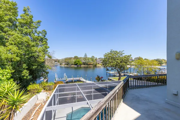 a swimming pool with outdoor seating