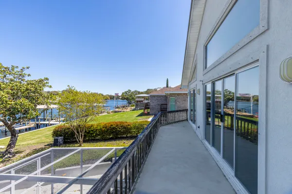 an outdoor space with furniture and a garden