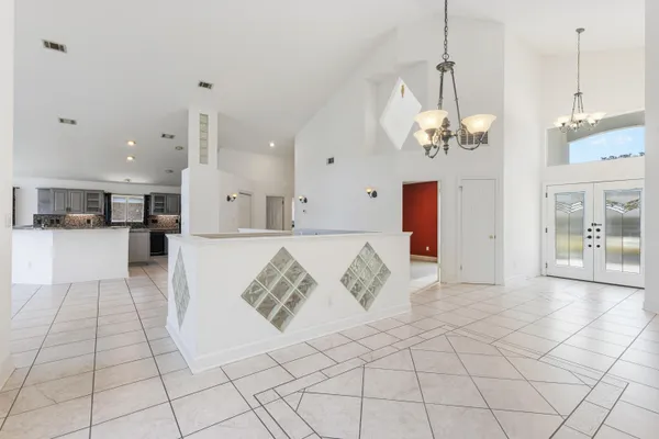 a view of a hallway with windows