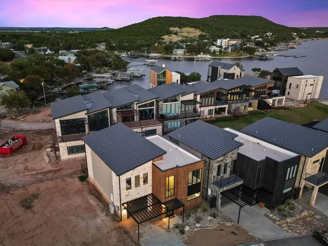 a aerial view of a house with a big yard