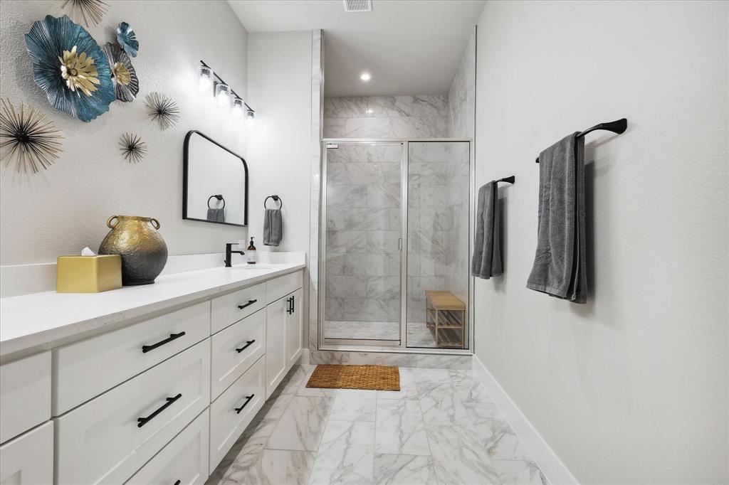 3 Blushing Bride Graford, TX 76449 - Photo 21 of 40 a bathroom with a tub sink and mirror