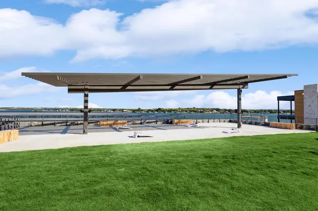 a view of a big room with a big yard and potted plants