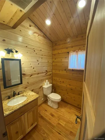 a view of an ocean with a building in the background