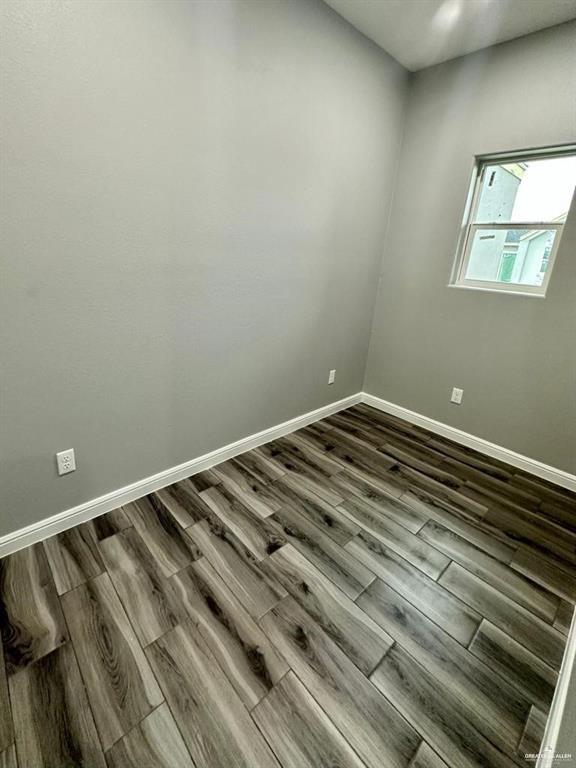 5402 North Crown Point Pharr, TX 78577 - Photo 11 of 19 a view of a room with wooden floor and window