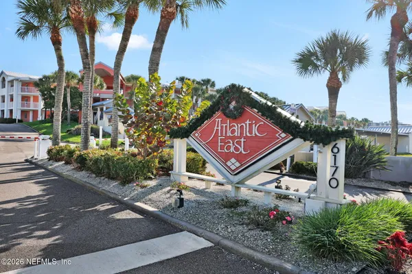 a view of a street with a sign on the side of it