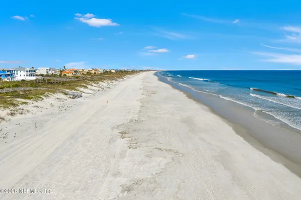 a view of a ocean with beach