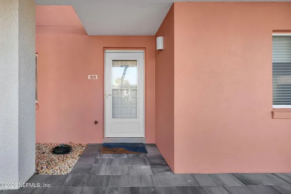 a view of a closet area with bedroom