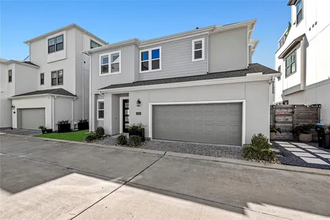 front view of a house with a street