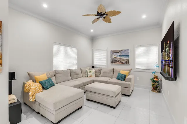 a kitchen with cabinets appliances a sink and a counter top space