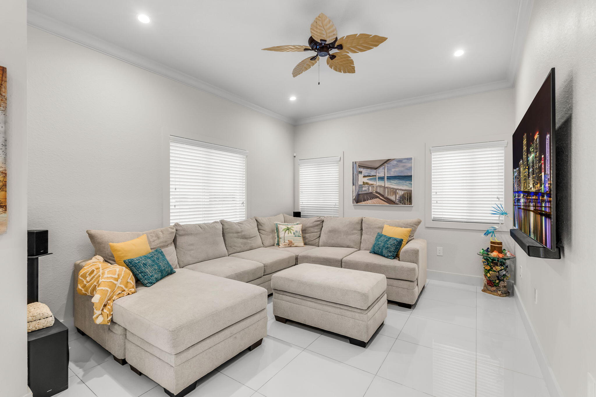 22 Tarpon Avenue Key Largo, FL 33037 - Photo 11 of 43 a living room with furniture a flat screen tv and a window