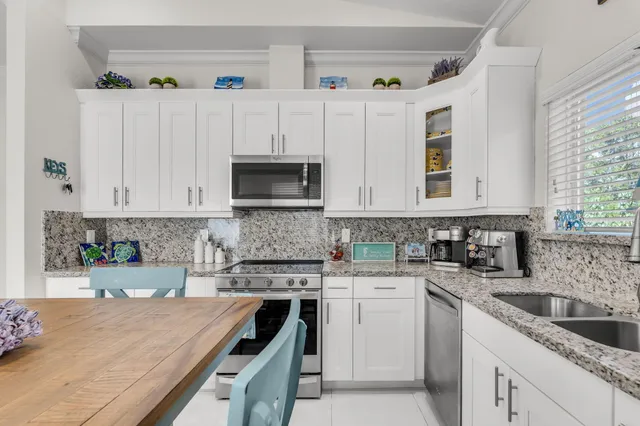 a bedroom with a bed and furniture