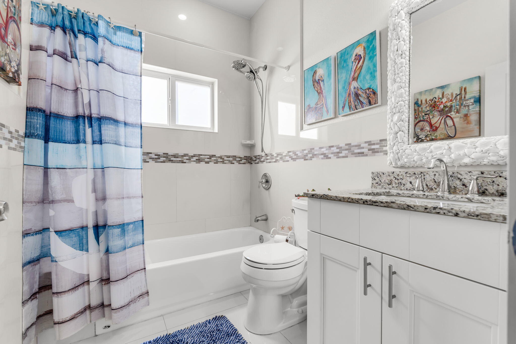 22 Tarpon Avenue Key Largo, FL 33037 - Photo 15 of 43 a bathroom with a sink a toilet and bathtub