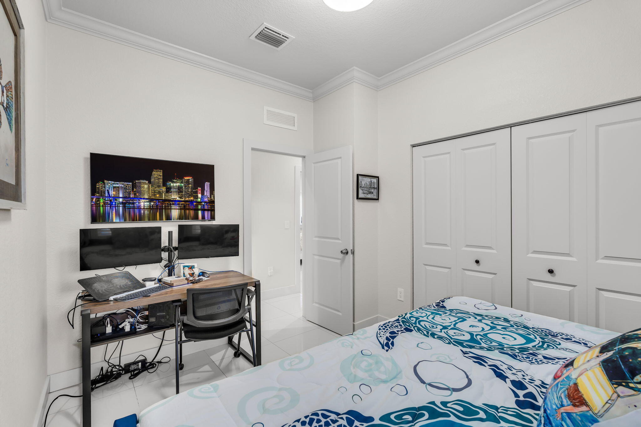 22 Tarpon Avenue Key Largo, FL 33037 - Photo 16 of 43 a bedroom with a bed and a chair