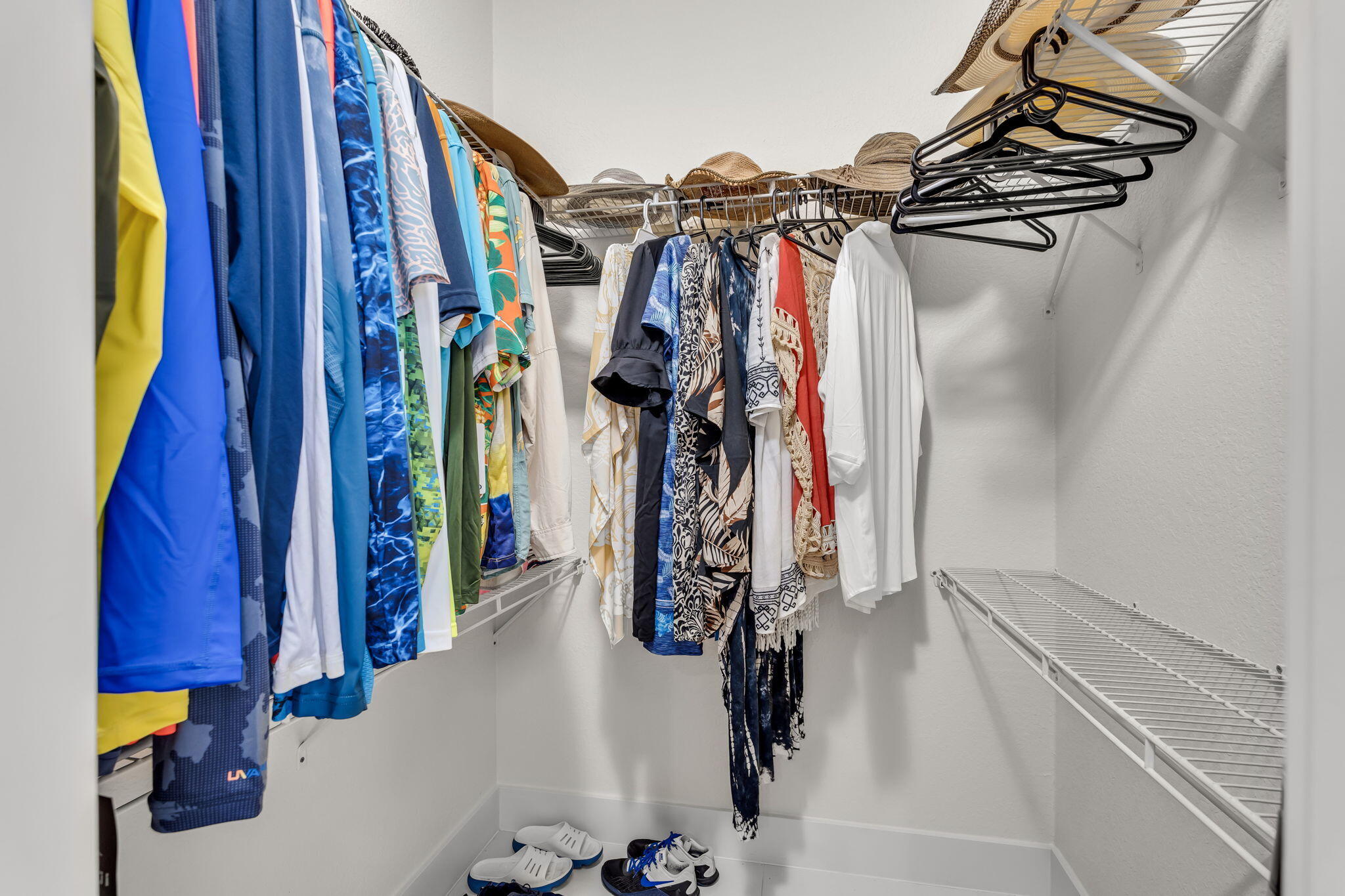 22 Tarpon Avenue Key Largo, FL 33037 - Photo 19 of 43 a view of walk in closet with clothes