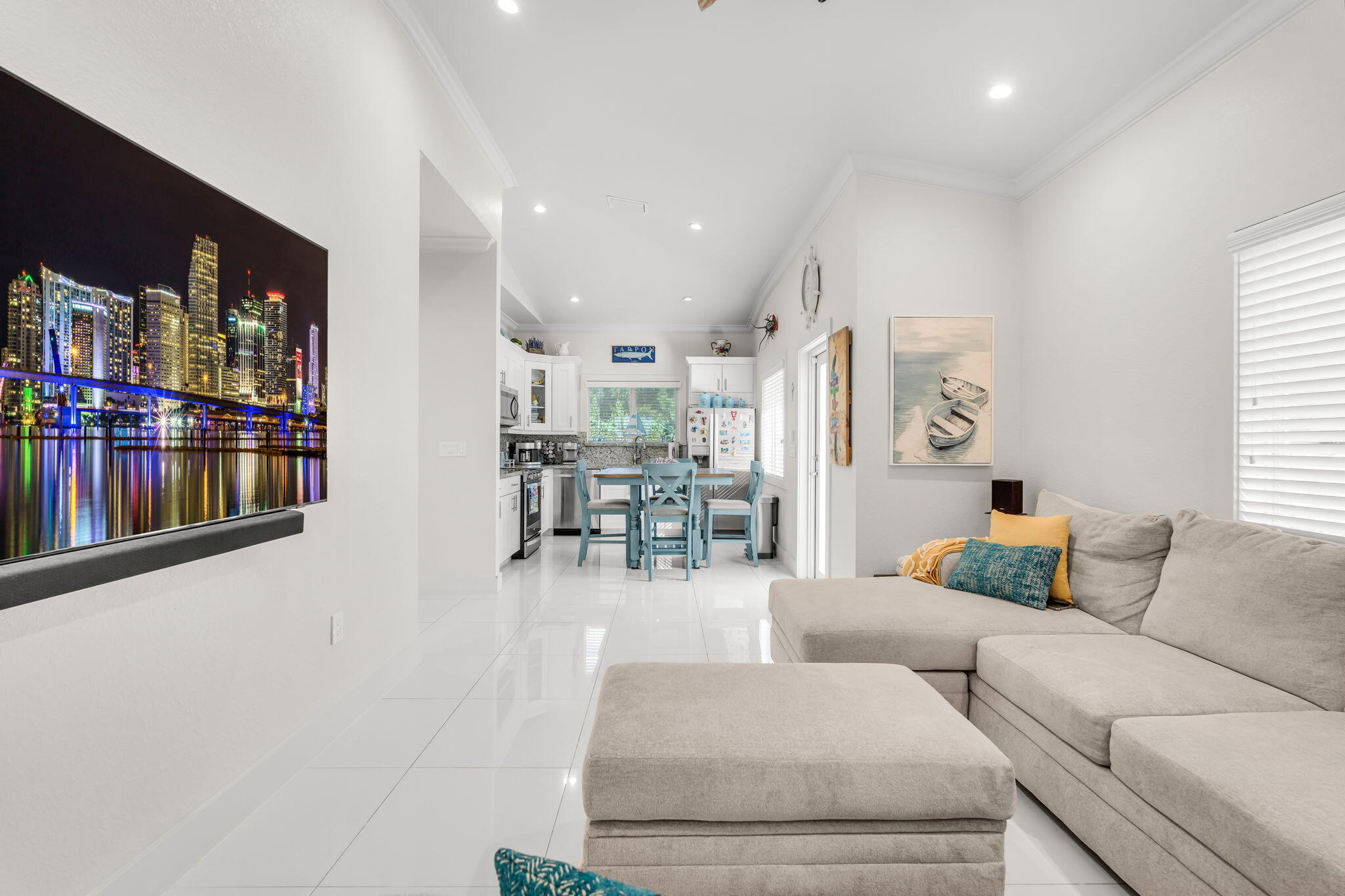 22 Tarpon Avenue Key Largo, FL 33037 - Photo 2 of 43 a living room with furniture and a flat screen tv