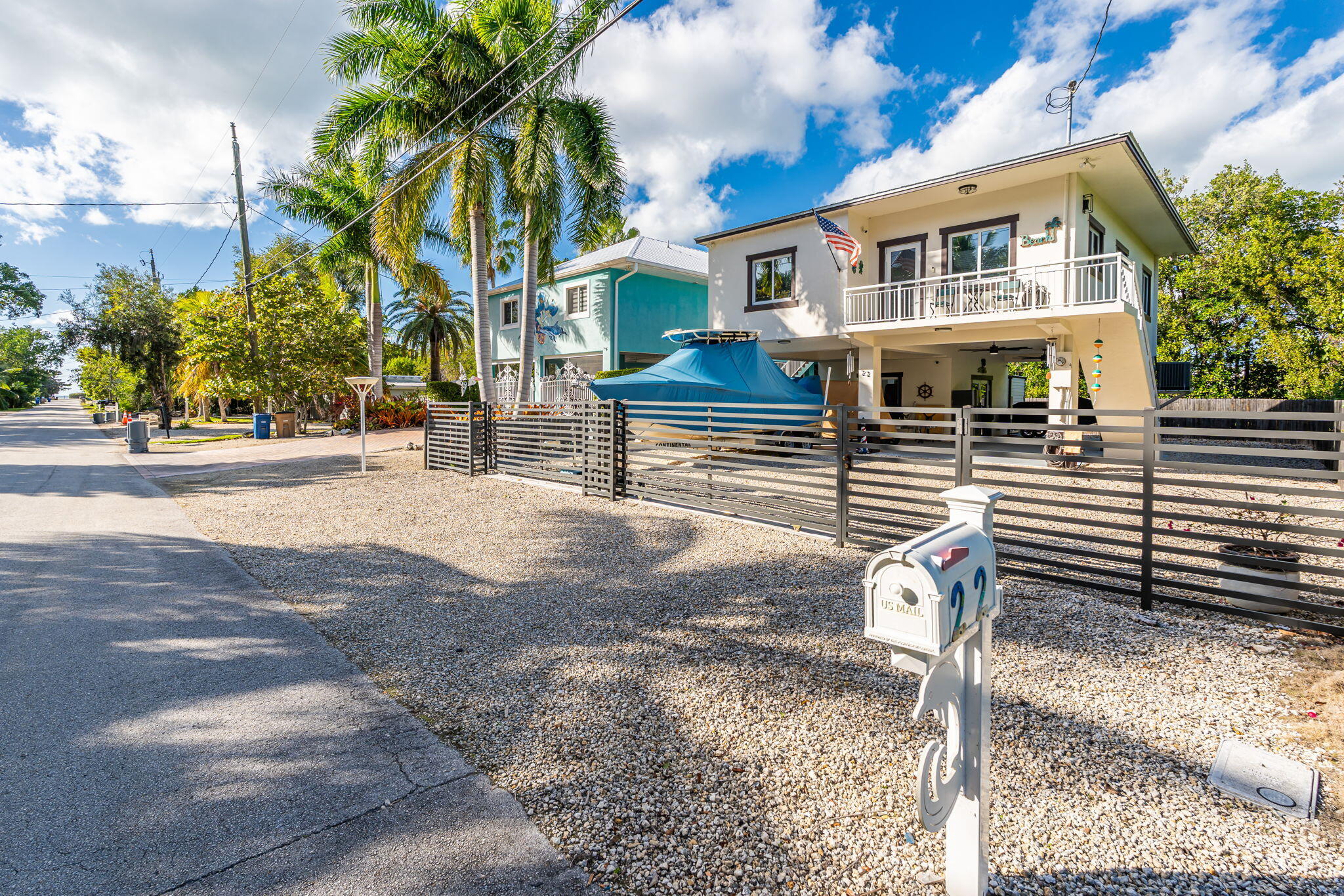 22 Tarpon Avenue Key Largo, FL 33037 - Photo 28 of 43 a front view of a house with a yard