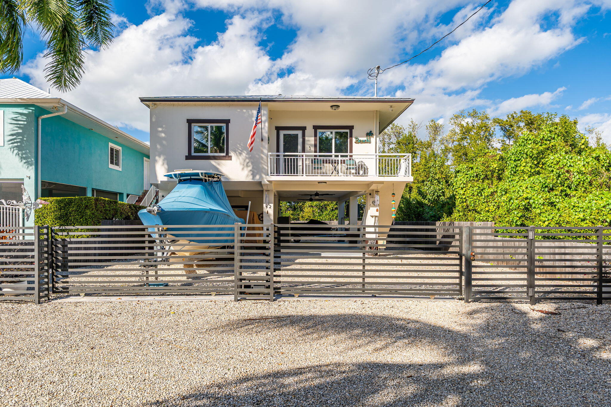 22 Tarpon Avenue Key Largo, FL 33037 - Photo 30 of 43 a front view of a house with garage