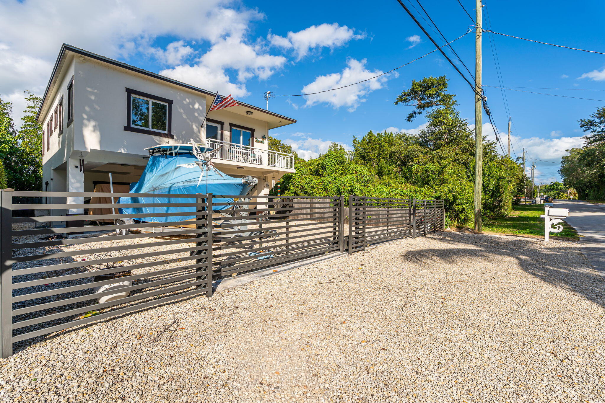 22 Tarpon Avenue Key Largo, FL 33037 - Photo 32 of 43 a view of a house with a street