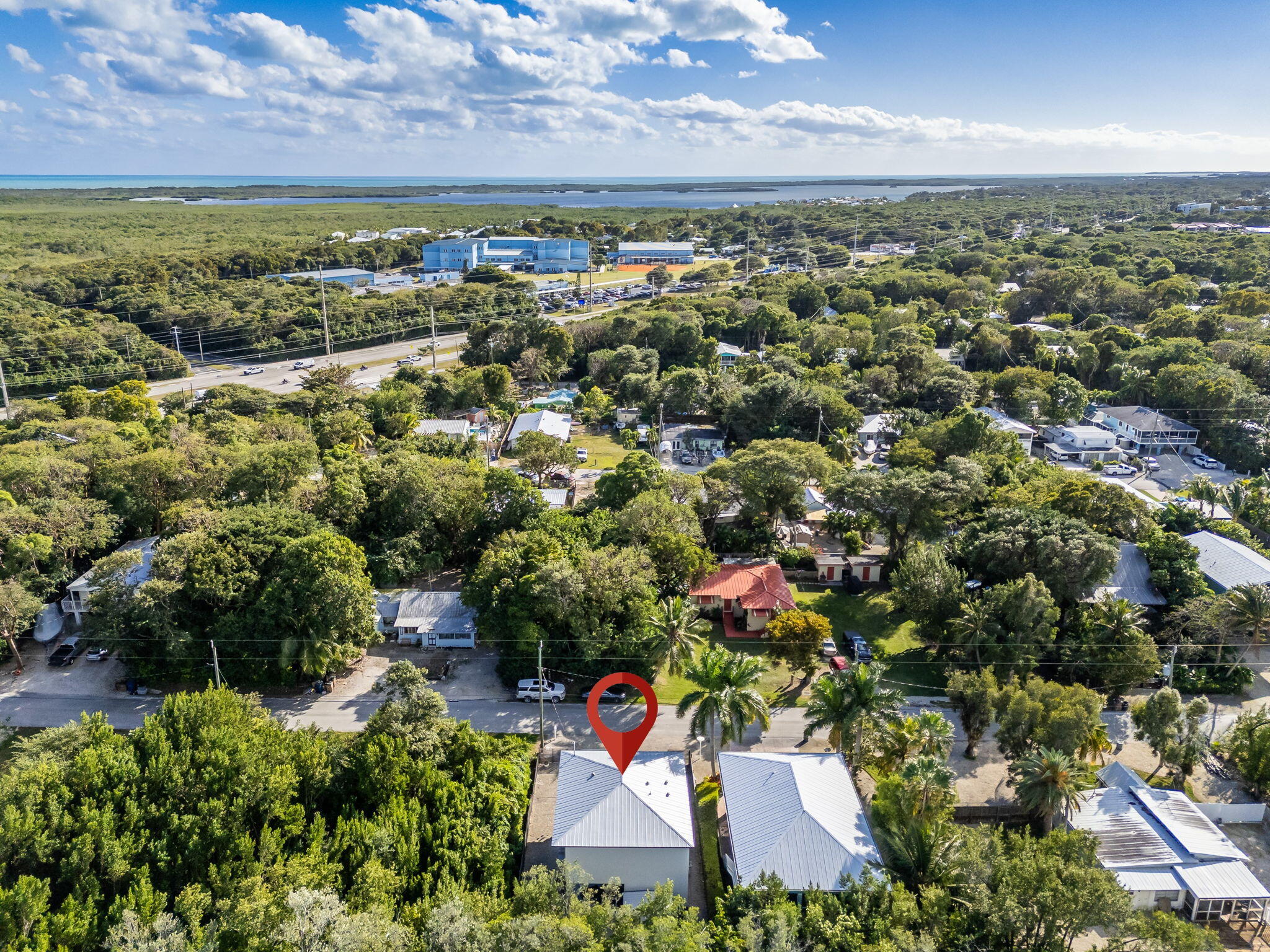 22 Tarpon Avenue Key Largo, FL 33037 - Photo 38 of 43 an aerial view of residential houses with outdoor space and trees